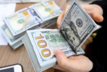 Dollar declines on black market