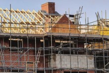 Growth momentum slows in June