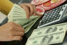 Vietnam doubles dong’s trading band after China devalues yuan