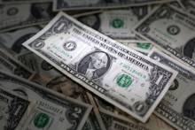 Dollar steps up against dong