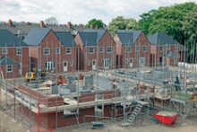 New housing output tops the magic 200,000 figure... sort of